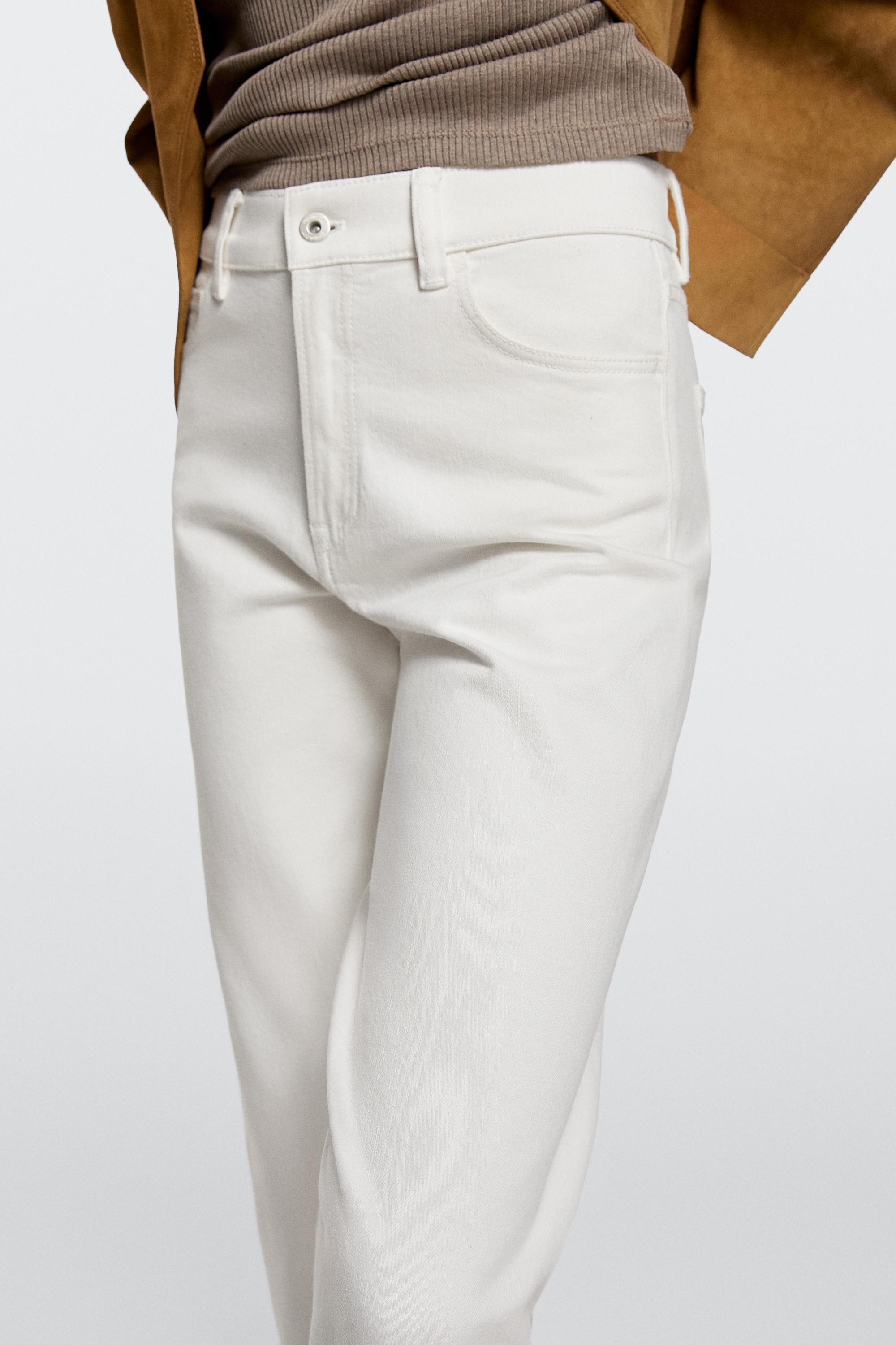 Jean capri taille moyenne retroussé